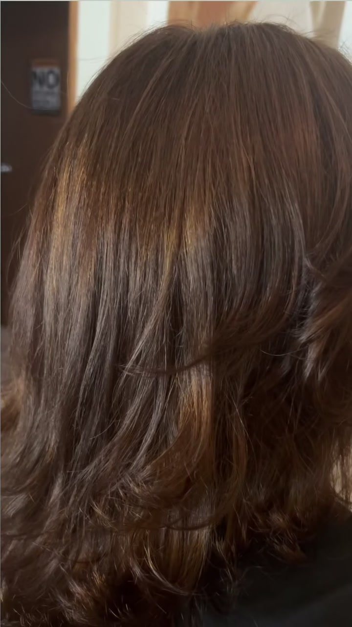 Rich chocolate brown color, back to her natural shade